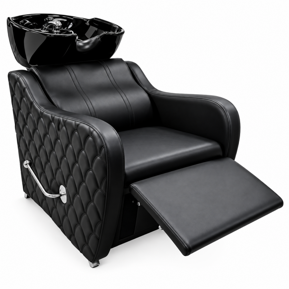 Black leather salon chair with a glossy black wash basin on top and a pull-out footrest.