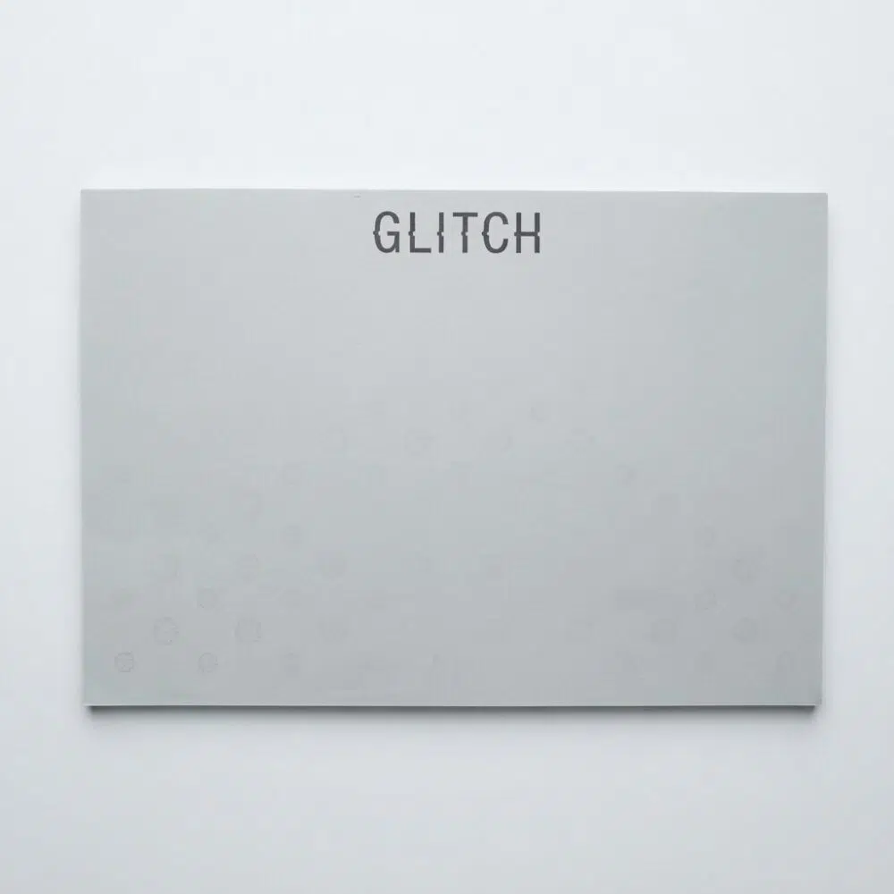 Light gray cover with the word GLITCH in dark letters at the top.