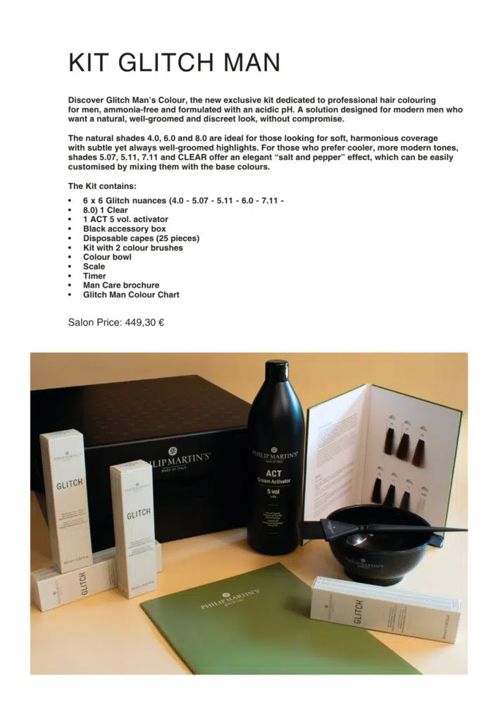 Display of Kit Glitch Man hair colouring products on a desk, with boxes, bottles, brushes and a green folder.