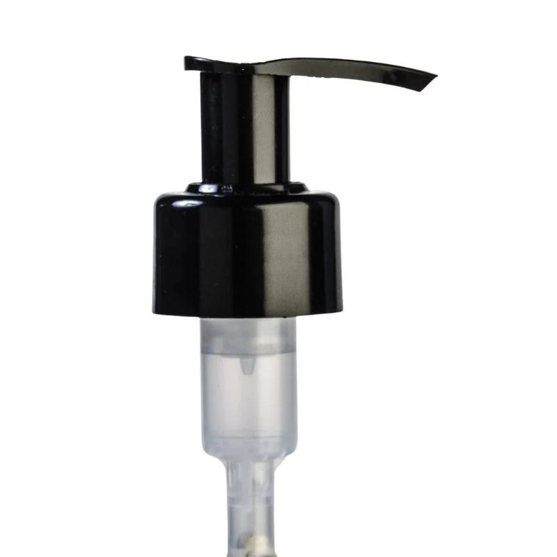Philip Martin's-pump-dispenser-black โ Rapple Black pump dispenser on top of a transparent bottle, used for dispensing lotion or soap