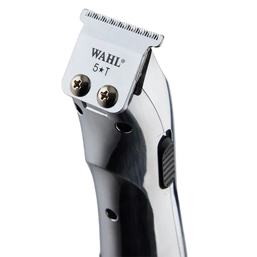 Close-up of a Wahl electric hair clipper with chrome blades and black handle