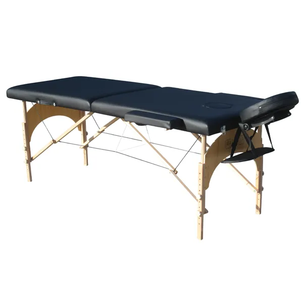 Portable massage table with navy cushions, wooden frame, and a face cradle at one end.