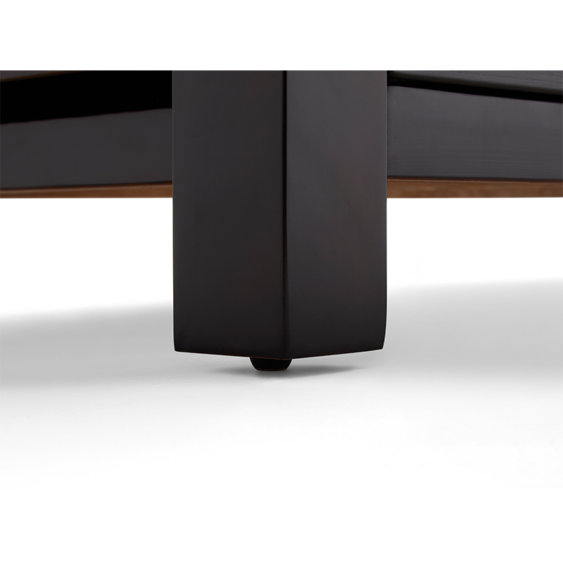 4png โ Rapple Close-up of a black rectangular furniture leg with a small wheel on a white floor, part of a low table or bed frame visible above.