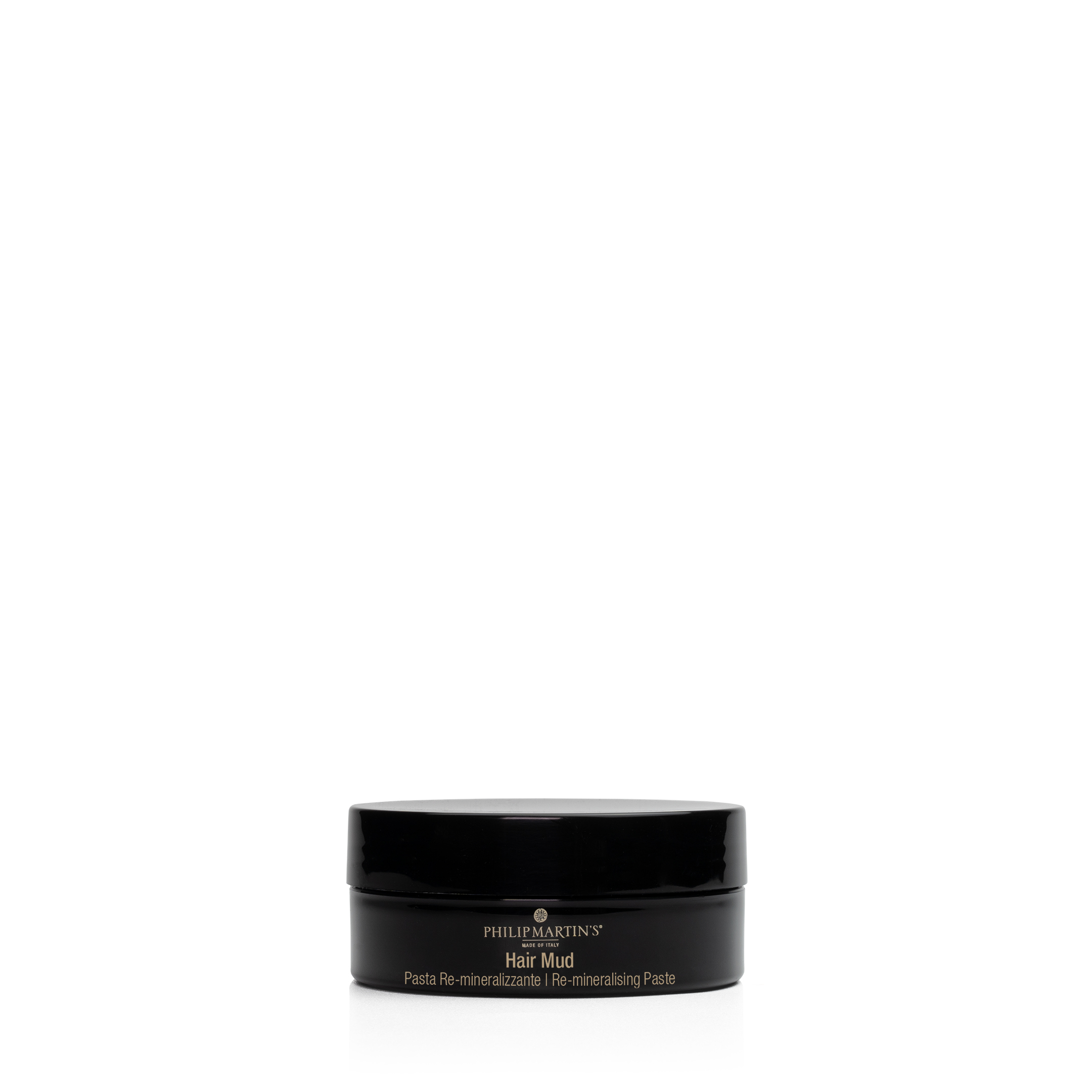 Philip Martins Hair Mud – Rapple Philip Martin's Hair Mud hair styling paste in a black jar with gold lettering, Made in Italy (Pasta Re-mineralizzante)