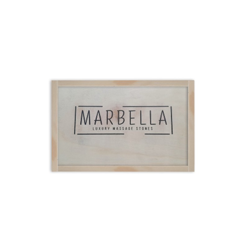 Hot_stone_set_20pcjpg โ Rapple Sign displaying MARBELLA Luxury Massage Stones logo on a light wooden frame
