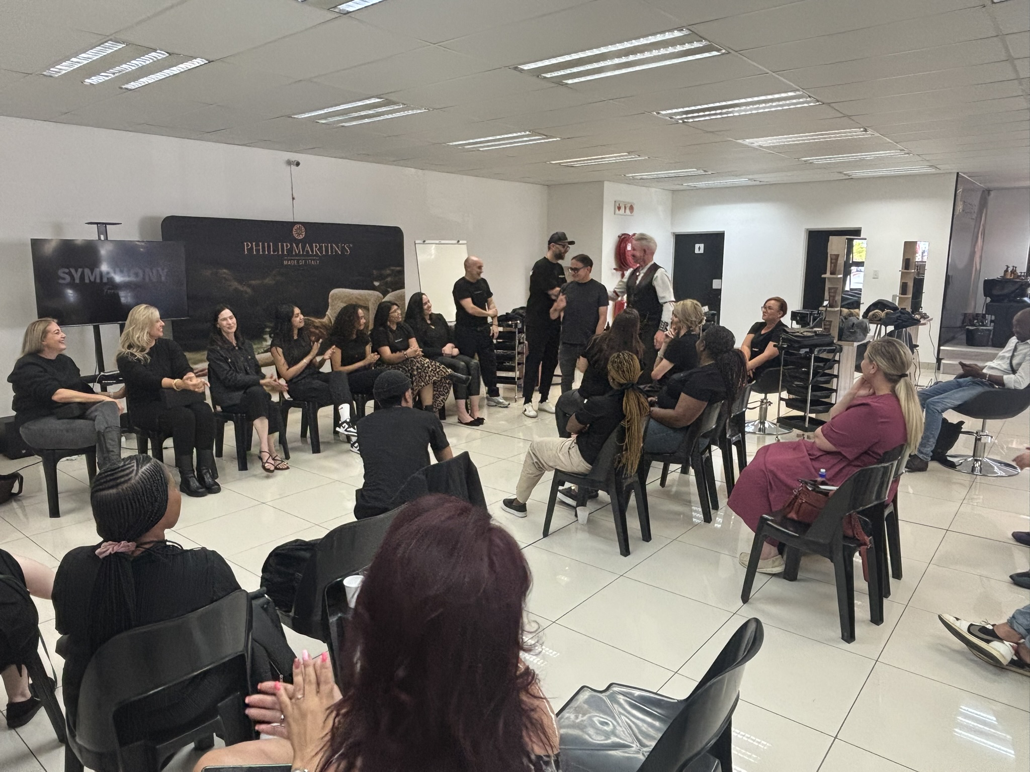 Hands-on styling demonstration with the full room watching