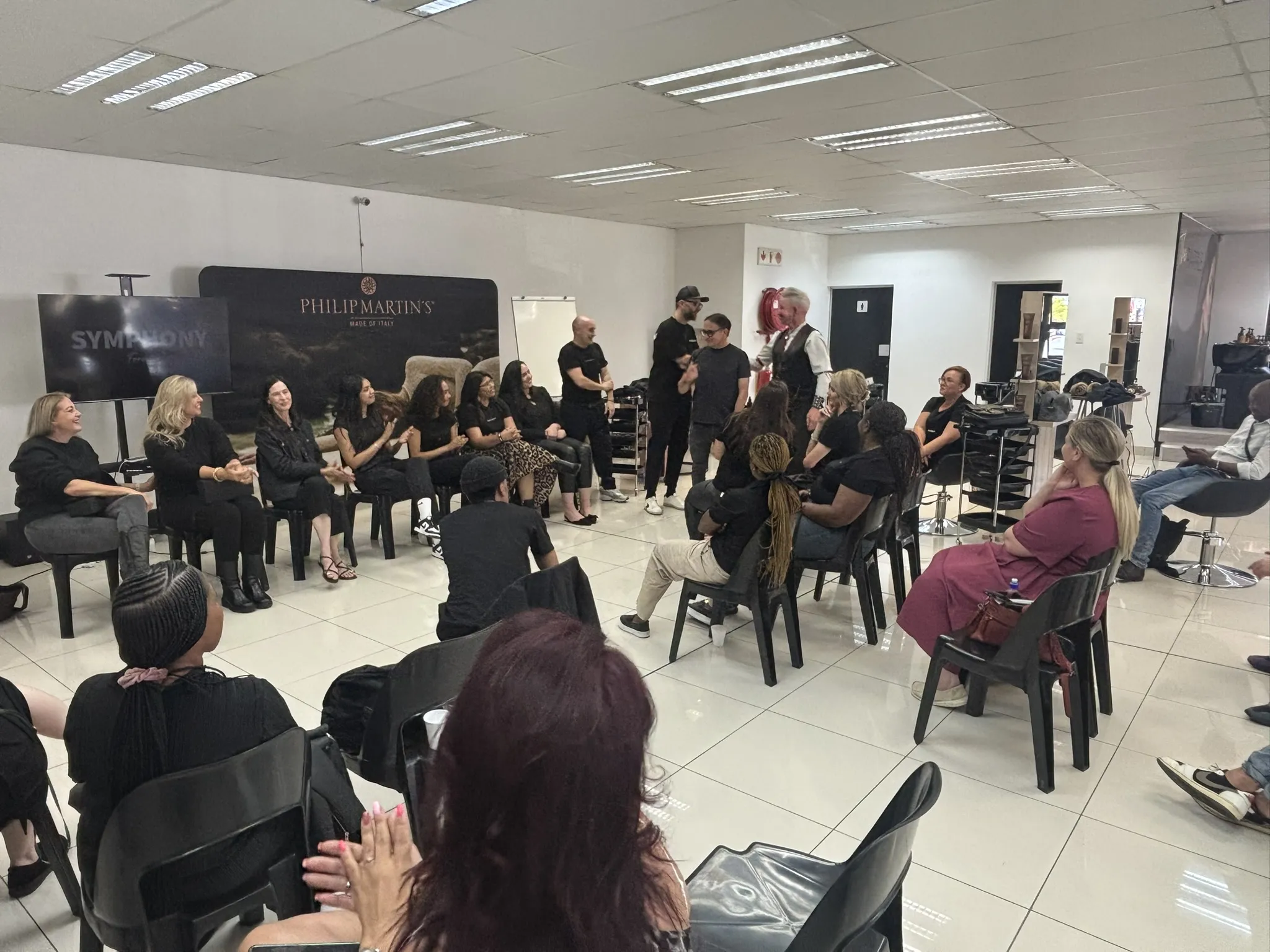 Hands-on styling demonstration with the full room watching