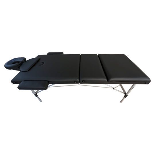 Black folding massage table with padded sections and face cradle, fully extended for a treatment session