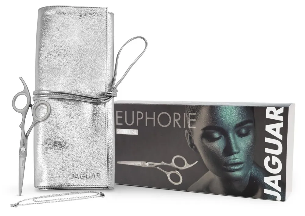 Silver textured leather roll-up case with scissors attached, standing beside a Jaguar box labeled EUPHORIE Silver Line