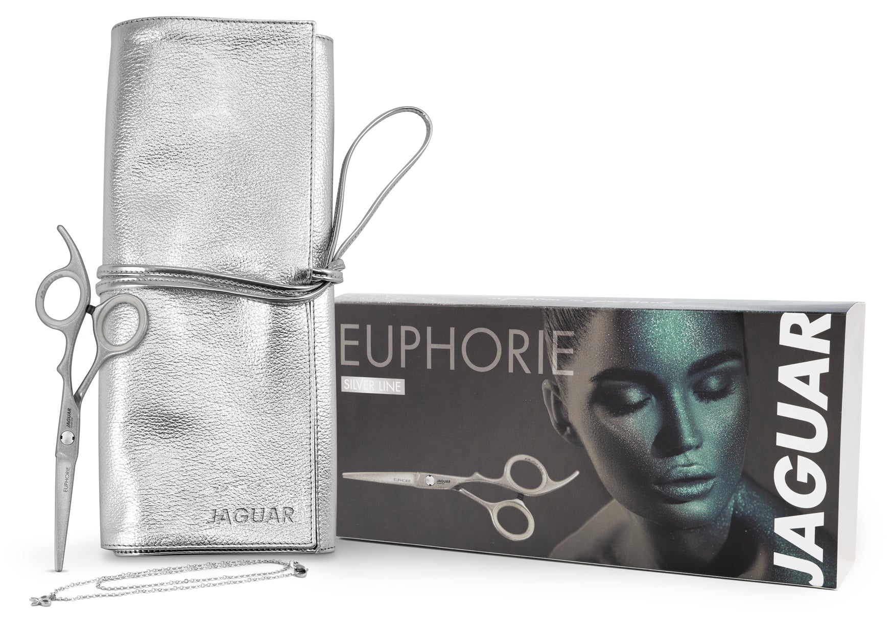 WA25_Set-Verpackung_web โ Rapple Silver textured leather roll-up case with scissors attached, standing beside a Jaguar box labeled EUPHORIE Silver Line