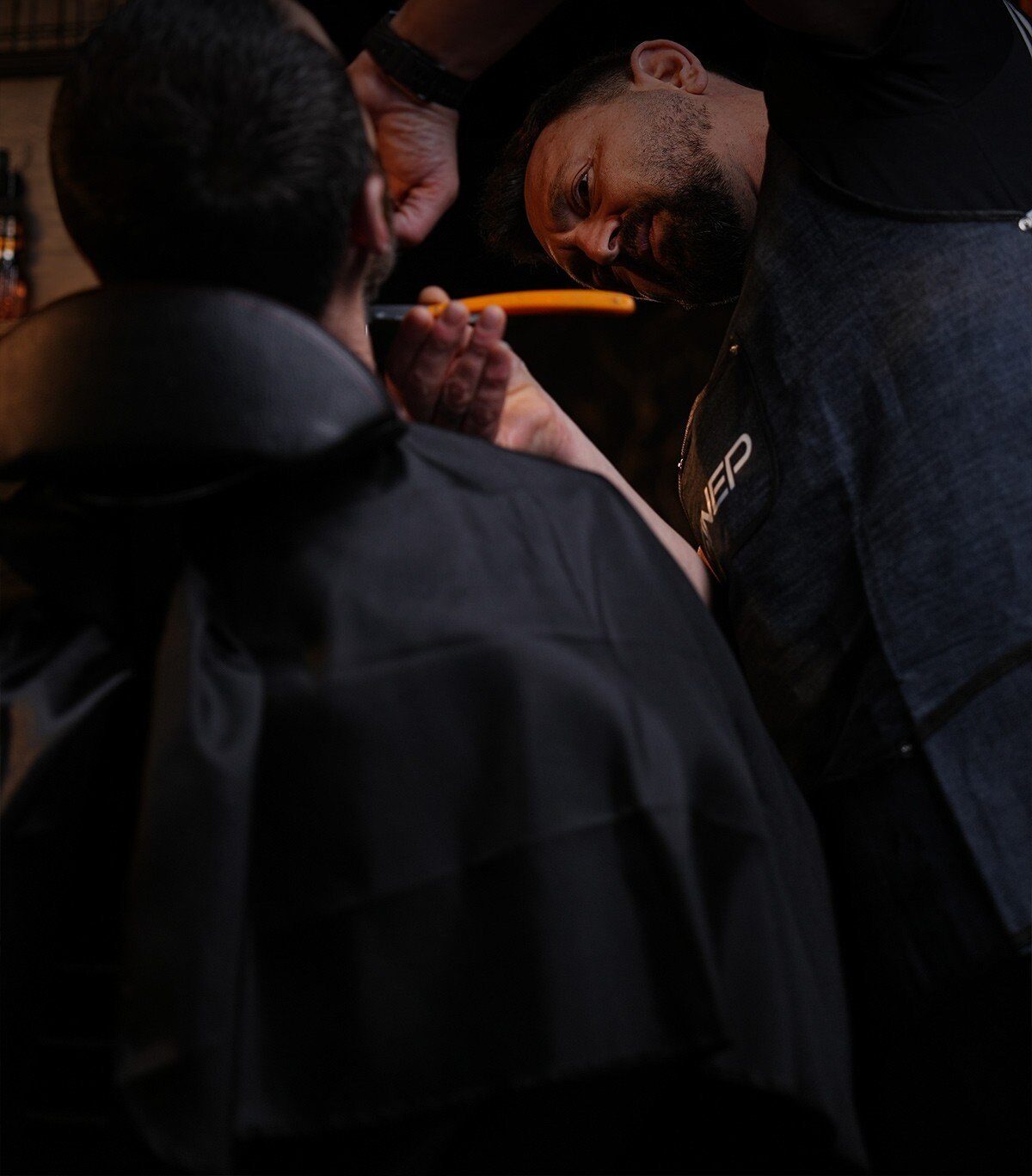 Straight-razor shave in the barber shop