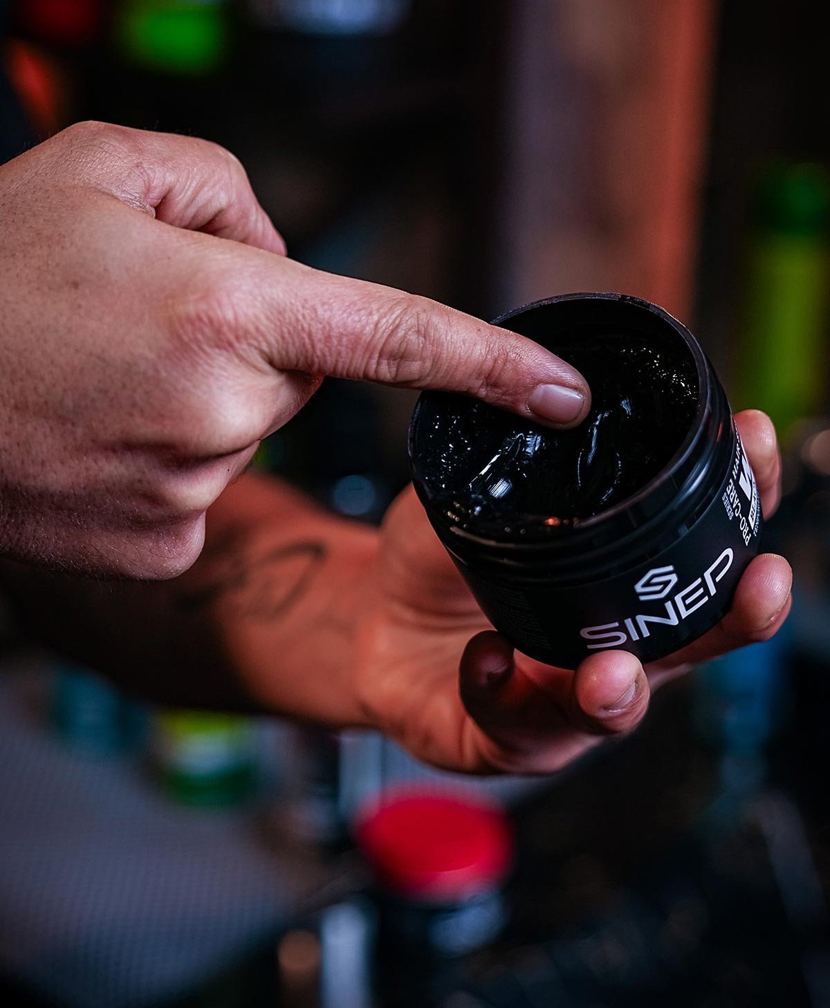 Barber scooping SINEP Black Wax