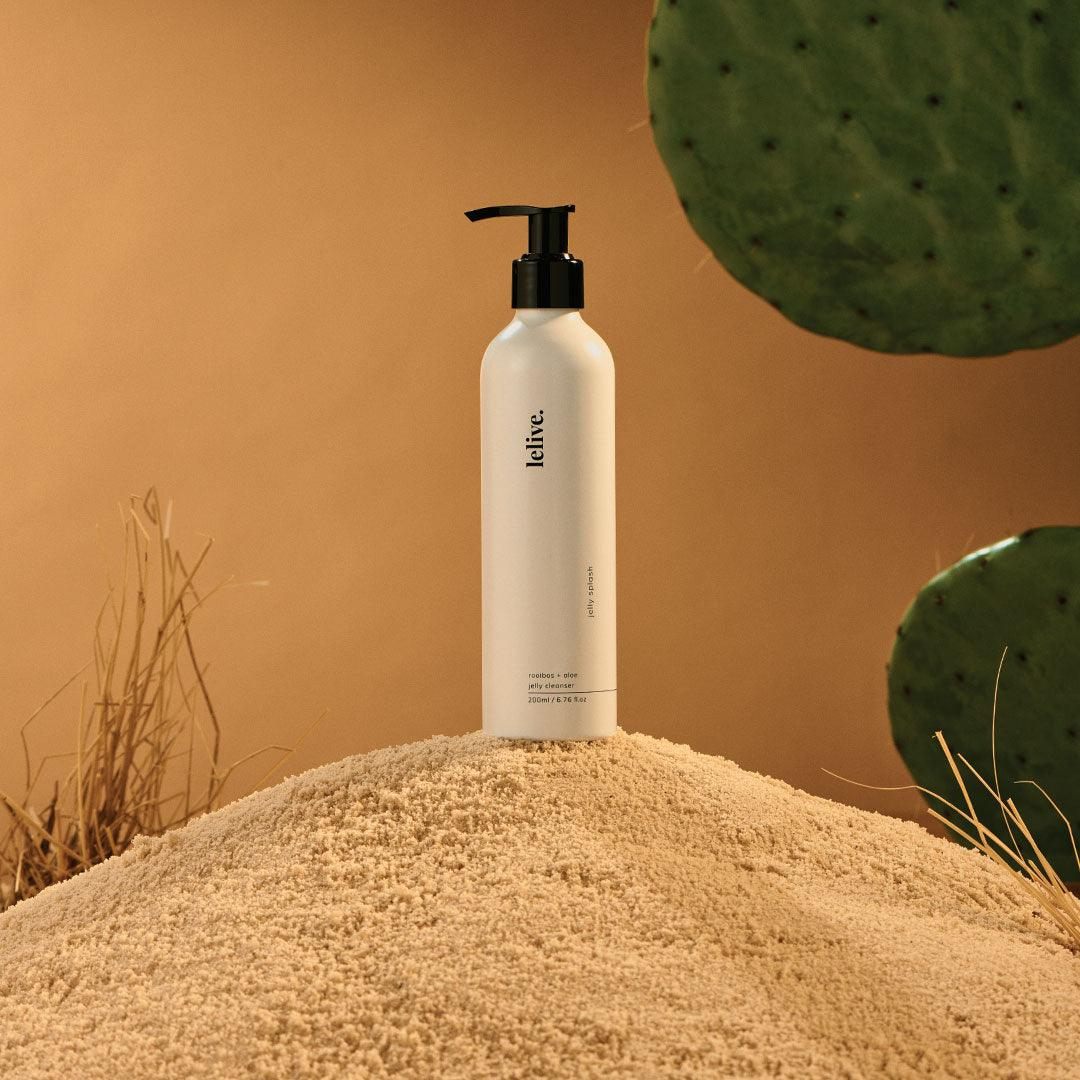 Spa Therapy pump bottle on sand